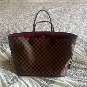 Authentic Louis Vuitton never full GM bag.